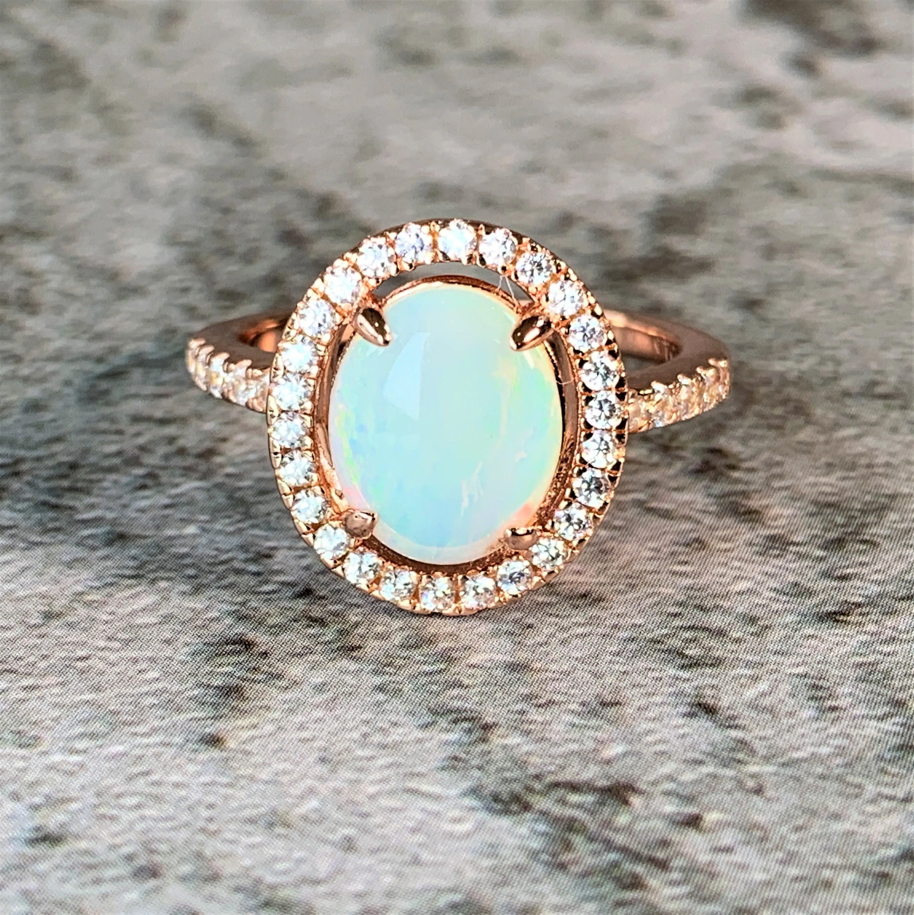 Rose Gold Plated White Opal 10x8mm halo ring