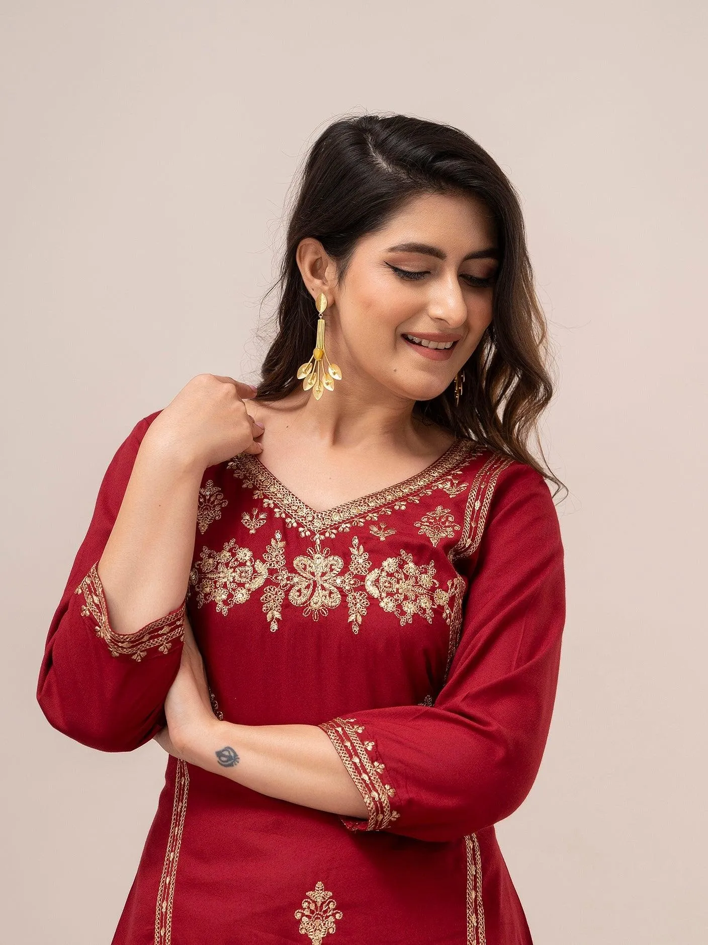 Women Red Sequinned Yoke Design Kurta with Trousers